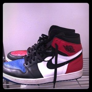 Size 11 black and varsity red air jordans (used)